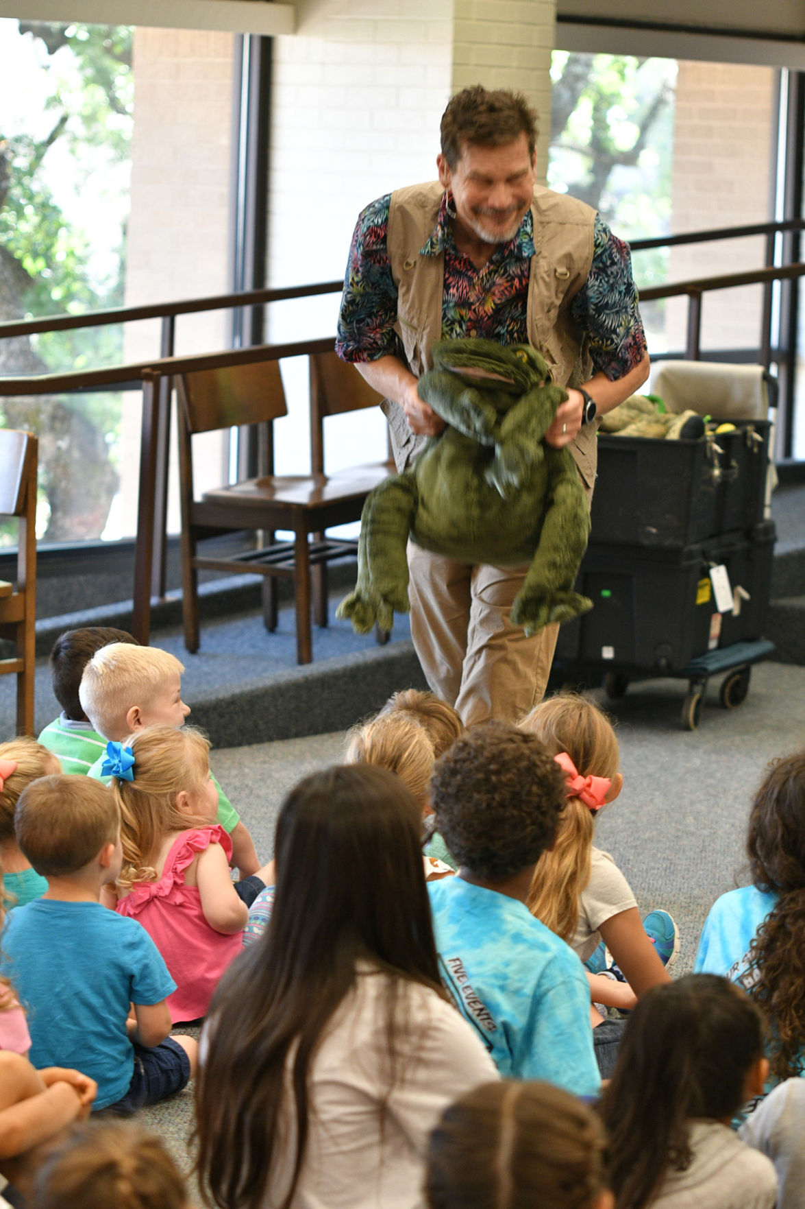 Singing zoologist Lucas Miller visits Bryan library